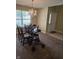 Dining area featuring modern lighting fixture and front door entry at 7440 Oakview Dr, Avon, IN 46123