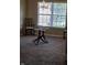 Inviting dining space features natural light from large window and neutral tones at 7440 Oakview Dr, Avon, IN 46123