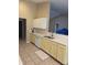 Bright kitchen with white cabinets, stainless steel dishwasher, and new countertops at 7440 Oakview Dr, Avon, IN 46123