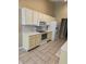 Modern kitchen featuring white appliances, updated cabinets, and ample countertop space at 7440 Oakview Dr, Avon, IN 46123