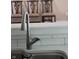 Modern kitchen faucet with sleek design complements the white tile backsplash at 7440 Oakview Dr, Avon, IN 46123