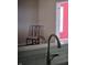 View of a living space with a chair in the corner and a glimpse of a bright room at 7440 Oakview Dr, Avon, IN 46123