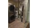 Utility room with new washer and dryer, water heater and a modern Carrier furnace at 7440 Oakview Dr, Avon, IN 46123