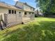 Large backyard featuring a spacious deck, perfect for outdoor dining and entertaining, with a lush green lawn at 757 Winter Way, Carmel, IN 46032