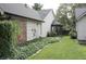 Backyard view with lush greenery and a variety of plants at 7662 Micawber Ct, Indianapolis, IN 46256