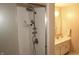 Renovated bathroom features walk-in shower with sleek fixtures and a vanity at 7662 Micawber Ct, Indianapolis, IN 46256