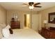 Cozy bedroom with a queen-sized bed, warm lighting, and tasteful decor creating a comfortable and inviting atmosphere at 7662 Micawber Ct, Indianapolis, IN 46256