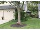 Charming home with a well-manicured front yard and a delightful display of flowers at 7662 Micawber Ct, Indianapolis, IN 46256