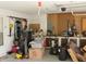 Well-lit garage featuring ample storage space and organizational systems for tools and equipment at 7662 Micawber Ct, Indianapolis, IN 46256