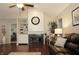 Cozy living room with a fireplace and built-in shelving at 7662 Micawber Ct, Indianapolis, IN 46256