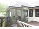 Covered porch with neutral colors; offering extra entertaining space and indoor/outdoor living at 7662 Micawber Ct, Indianapolis, IN 46256