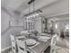 Dining room features a dining table with seating for six, chandelier, and a decorative hutch at 784 S Restin Rd, Greenwood, IN 46142