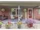 Cozy front porch featuring comfortable seating, decorative plants, and a welcoming atmosphere at 784 S Restin Rd, Greenwood, IN 46142