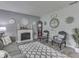 Cozy living area featuring a fireplace, comfortable seating, and charming decorative accents at 784 S Restin Rd, Greenwood, IN 46142