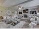 Inviting living room with comfortable seating, fireplace, and mounted TVs, ideal for relaxation at 784 S Restin Rd, Greenwood, IN 46142