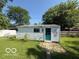 Detached outbuilding in the backyard, offering flexible space at 7918 Bonita Ct, Indianapolis, IN 46219