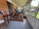 Enclosed porch featuring a cozy rug and sun-filled windows, ideal for relaxation at 7918 Bonita Ct, Indianapolis, IN 46219