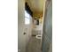 Bathroom featuring a tiled shower and sink with vanity, with natural light streaming through the window at 8008 Cherington Dr, Indianapolis, IN 46227