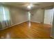 Bedroom featuring hardwood floors, natural light, and a ceiling fan for comfort and style at 8008 Cherington Dr, Indianapolis, IN 46227