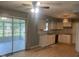 Open kitchen boasts updated appliances and fixtures, and access to sunroom at 8008 Cherington Dr, Indianapolis, IN 46227