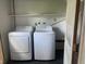Convenient laundry room equipped with a washer, and dryer at 8008 Cherington Dr, Indianapolis, IN 46227
