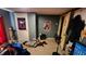 This bedroom has carpeted floors and features various posters on the gray walls at 8201 S Burlington Dr, Muncie, IN 47302