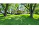 Charming single-story home featuring a welcoming front porch and a well-maintained lawn at 8201 S Burlington Dr, Muncie, IN 47302