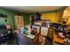 Functional kitchen with wooden cabinetry, tile floors, and modern appliances at 8201 S Burlington Dr, Muncie, IN 47302
