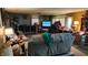 Living room showcasing comfortable sofas, carpet, and decor at 8201 S Burlington Dr, Muncie, IN 47302