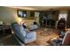 Cozy living room with carpeted floor, a television and comfortable seating at 8201 S Burlington Dr, Muncie, IN 47302