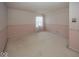 Bedroom with patterned walls and carpeted flooring at 8315 Union Chapel Rd, Indianapolis, IN 46240