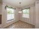 Bright breakfast nook with large windows, perfect for enjoying morning coffee at 8315 Union Chapel Rd, Indianapolis, IN 46240