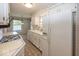 Functional kitchen featuring white cabinetry, providing ample storage and space at 8315 Union Chapel Rd, Indianapolis, IN 46240