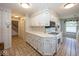 Bright kitchen featuring white cabinetry and modern appliances, perfect for cooking and entertaining at 8315 Union Chapel Rd, Indianapolis, IN 46240