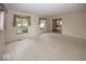 Bright living room with two windows, creating a comfortable and inviting living space at 8315 Union Chapel Rd, Indianapolis, IN 46240