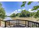Scenic water view of the lake from the wooden deck of this beautiful home at 8315 Union Chapel Rd, Indianapolis, IN 46240