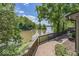 Scenic water view of the lake from the wooden deck of this beautiful home at 8315 Union Chapel Rd, Indianapolis, IN 46240
