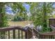 Wooden steps leading to a waterfront with mature trees surrounding the river at 8315 Union Chapel Rd, Indianapolis, IN 46240