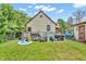 Spacious backyard with lawn, patio, and recreational items at 850 Duane St, Franklin, IN 46131