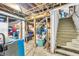 Unfinished basement with exposed ceiling, concrete floors and walls, and a staircase to the right at 850 Duane St, Franklin, IN 46131