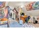 Attic bedroom with neutral carpet features a walk in closet, decor, and bright natural light at 850 Duane St, Franklin, IN 46131