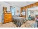 Cozy bedroom shows wood accents, natural light, and a comfortable bed at 850 Duane St, Franklin, IN 46131