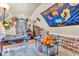 Attic bedroom features sloped ceiling, carpet flooring, window, and playful decor and a collection of Funko Pop figurines at 850 Duane St, Franklin, IN 46131