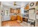 Well-lit kitchen with wood cabinets, essential appliances, and a cozy, lived-in ambiance at 850 Duane St, Franklin, IN 46131