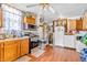 Kitchen featuring essential appliances, wood cabinets, and practical design elements at 850 Duane St, Franklin, IN 46131