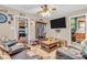 Inviting living room featuring comfortable leather seating and warm, neutral decor at 850 Duane St, Franklin, IN 46131