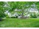 Well-kept backyard with a large deck, perfect for outdoor enjoyment and relaxation at 8827 Lindsey Ct, Fishers, IN 46038