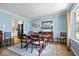Open concept dining room showcases elegant decor, natural light, and stylish accents at 8827 Lindsey Ct, Fishers, IN 46038