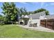 Backyard featuring a deck, grill, and outdoor seating area at 8929 Sunburst Cir, Indianapolis, IN 46227