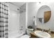 Neutral bathroom featuring shower-tub combination and a modern vessel sink at 8929 Sunburst Cir, Indianapolis, IN 46227